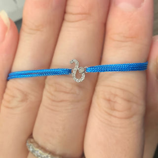 Diamanten sterrenbeeld armband met katoenen koord