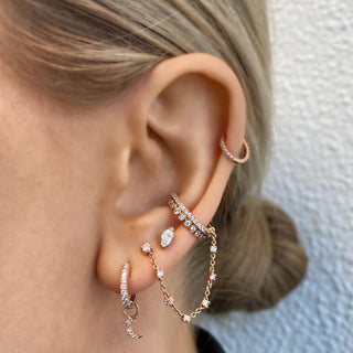 Enkele Ovale Ear Cuff met diamanten ketting in geelgoud